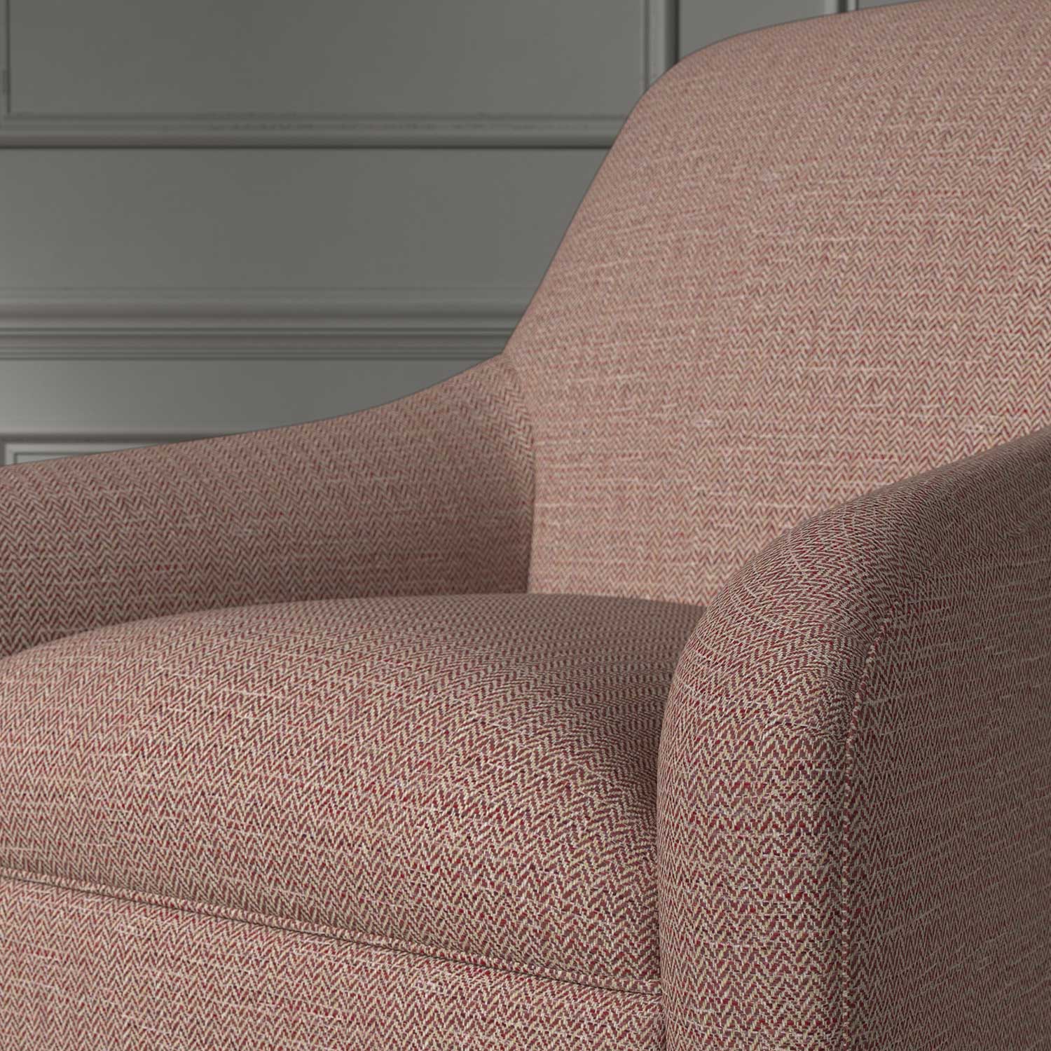 Close up of a chair covered in a woven fabric in a herringbone design in Roseberry
