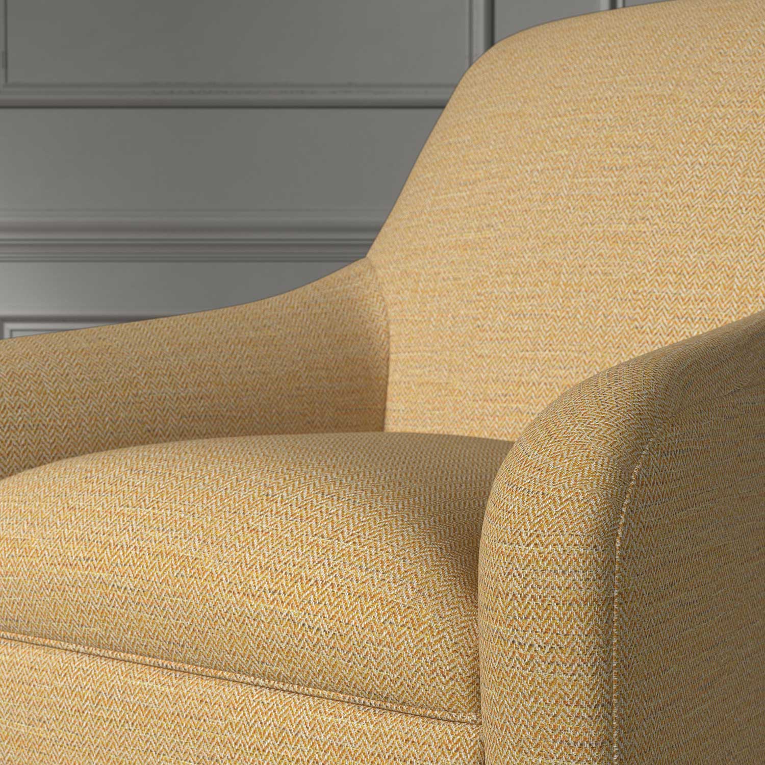 Close up of a chair covered in a woven fabric in a herringbone design in Marigold