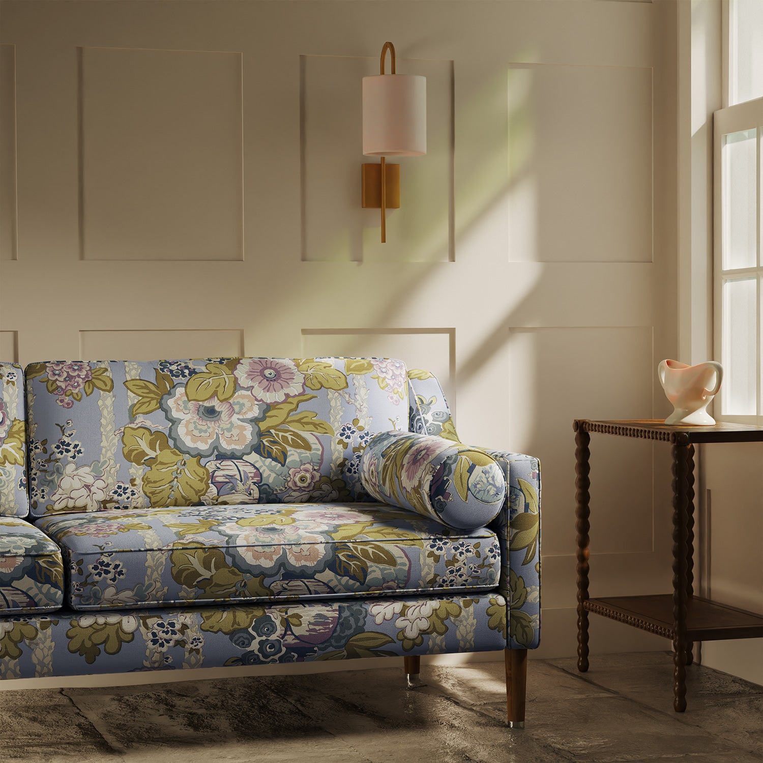 Sofa upholstered in a lively, large scale floral linen fabric