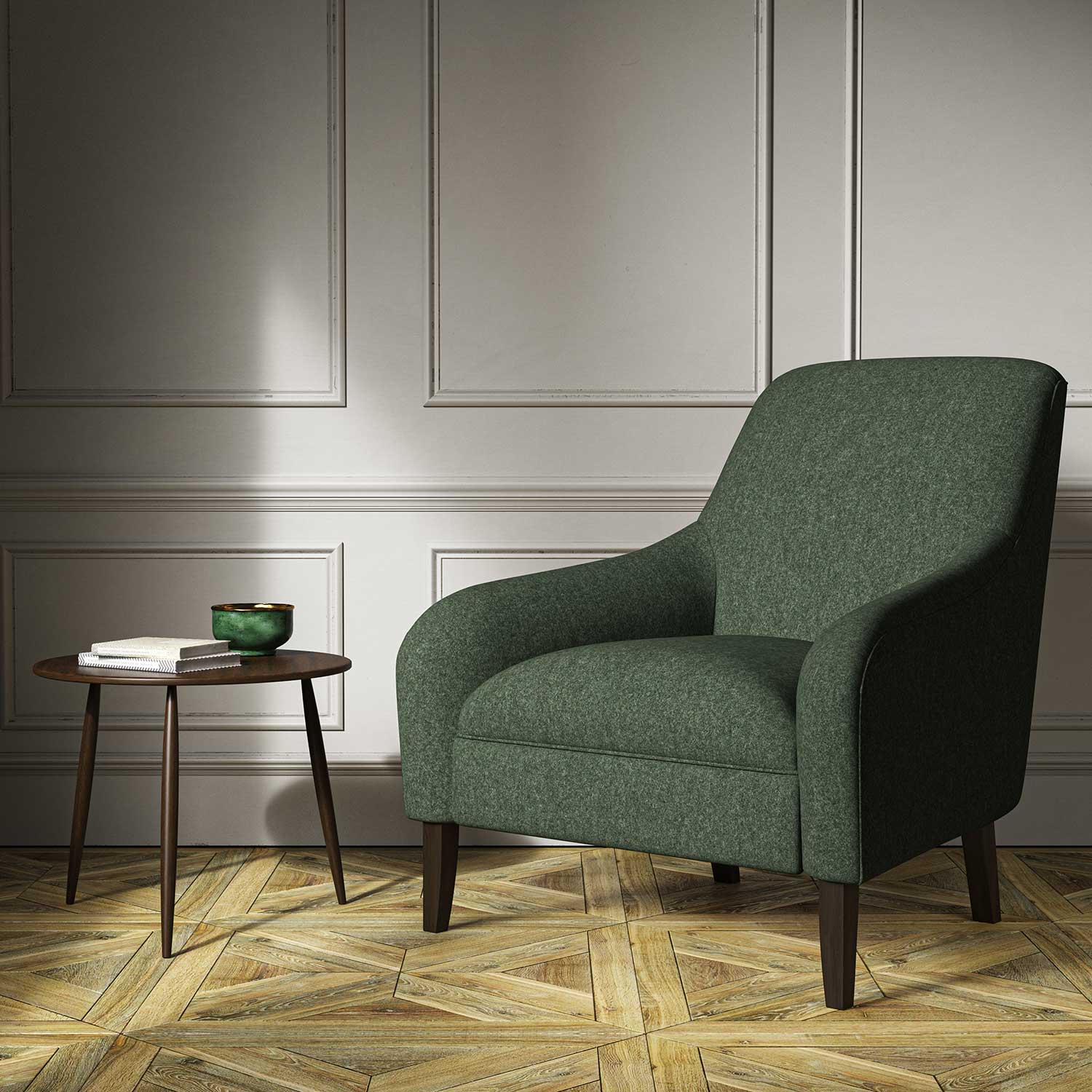 A green woven fabric on an armchair.
