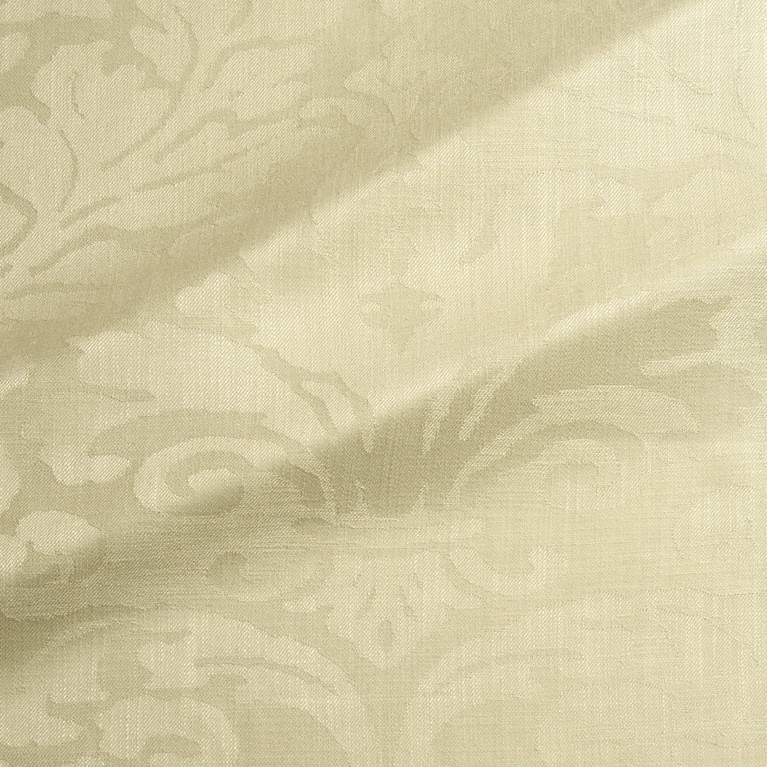 Fabric swatch of a contemporary damask fabric in a light green colour for upholstery and curtains.