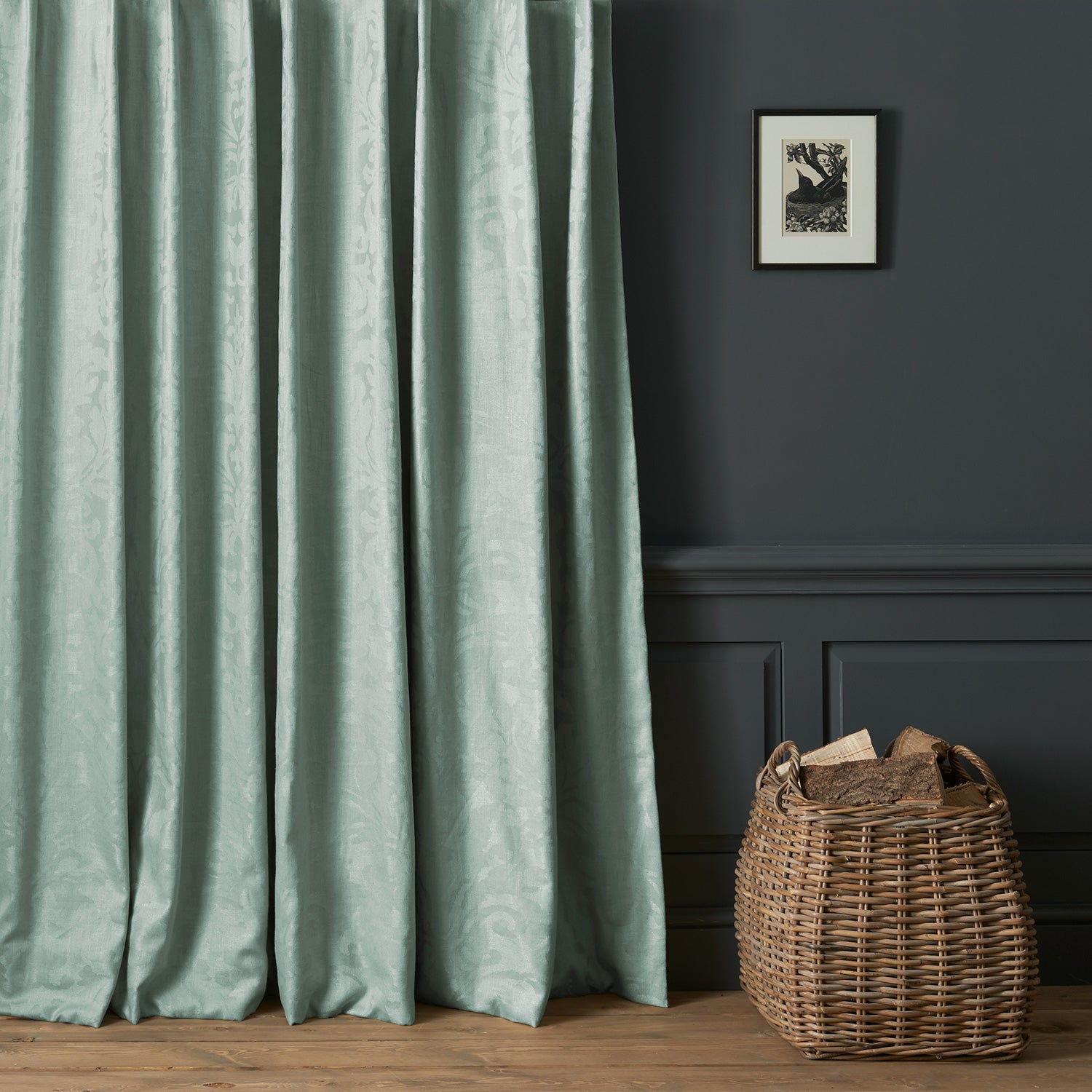 Curtains in a contemporary damask fabric with light blue colours.