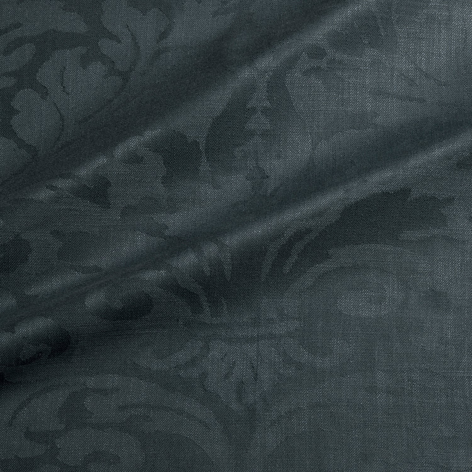 Fabric swatch of a contemporary damask fabric in dark grey colours for upholstery and curtains.