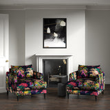 Armchairs in printed velvet fabric with ornamental garden scenic design in multicolours.