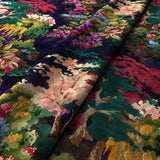 Printed velvet fabric with ornamental garden scenic design in multicolours for curtains and upholstery.