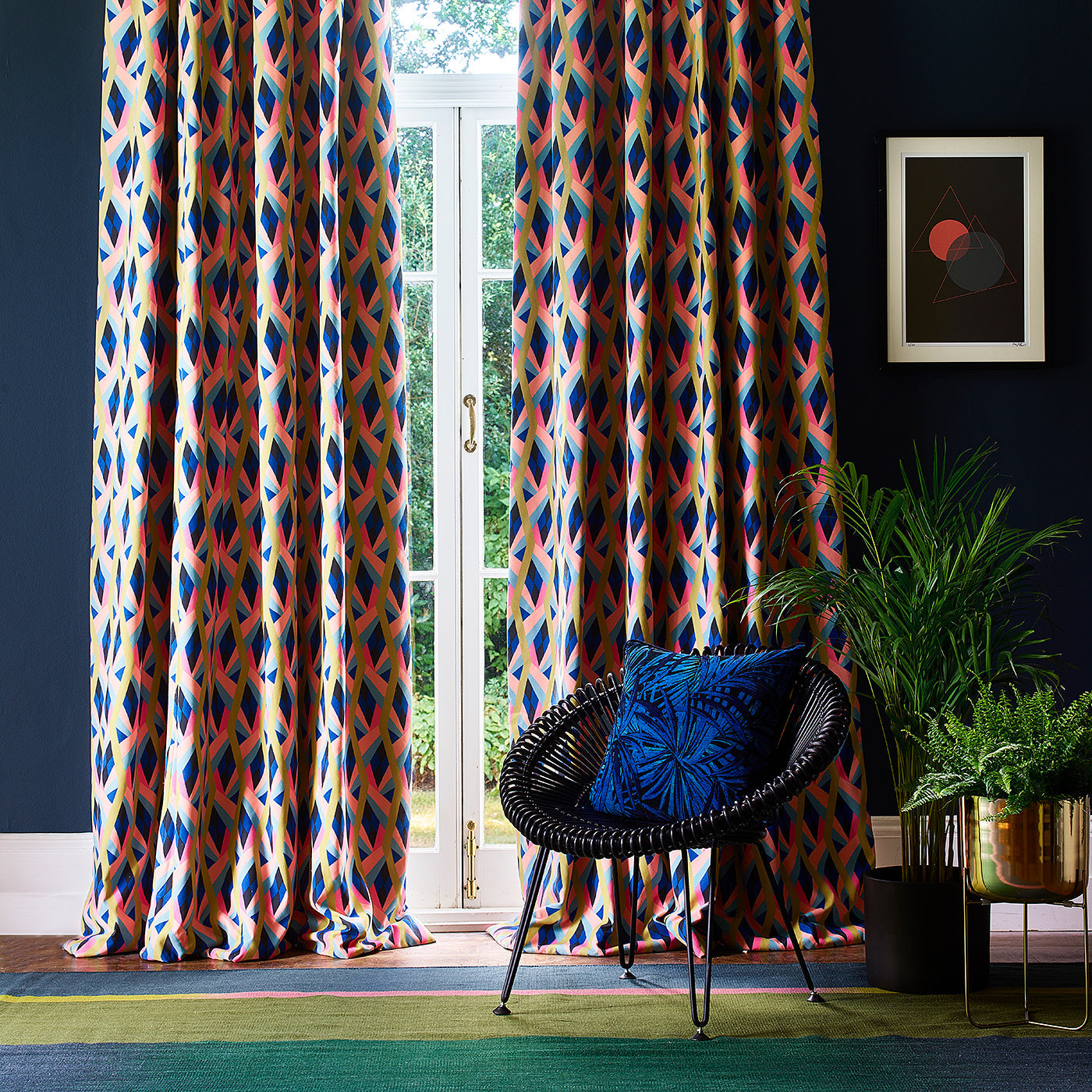Velvet curtains in a bright coloured geometric fabric