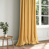 A yellow woven fabric shown as a curtain.