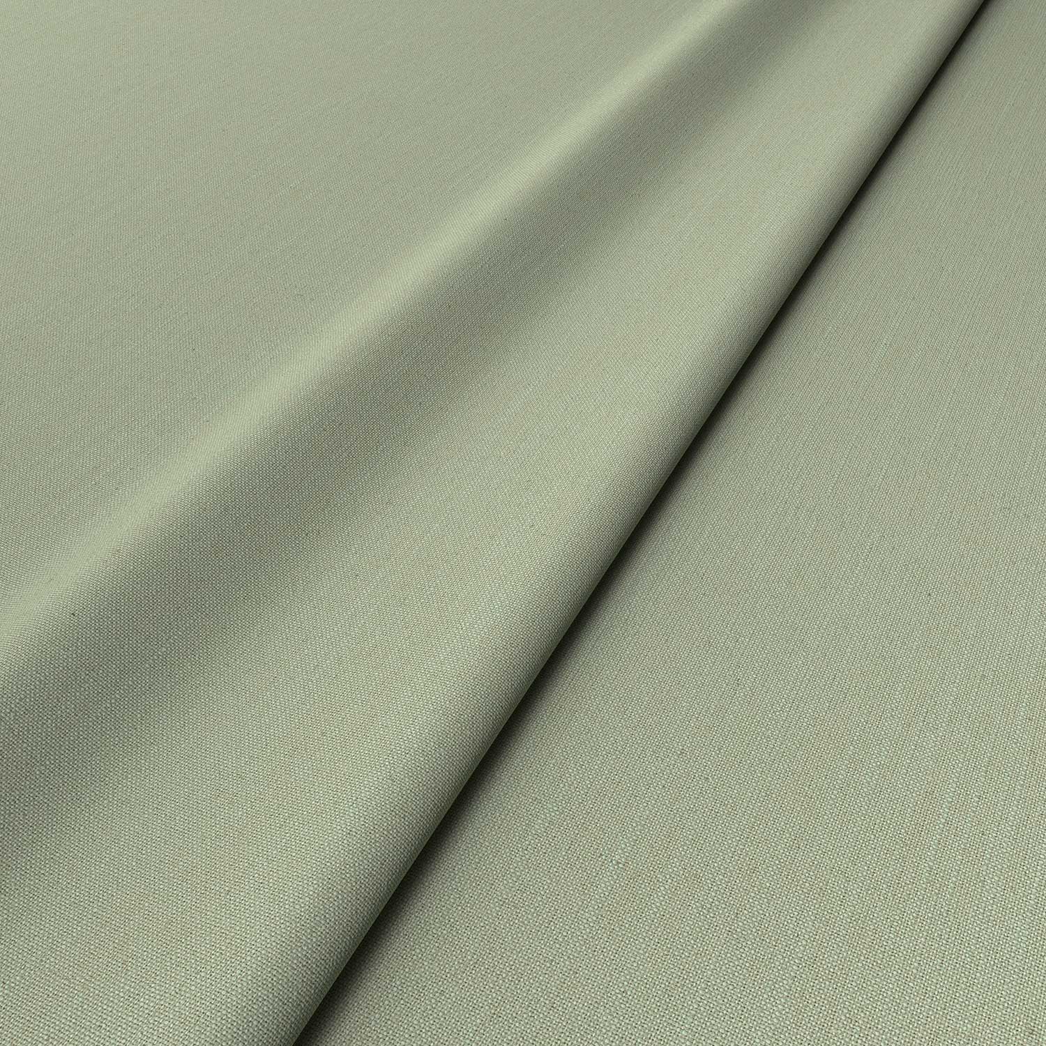 Sample of a green woven fabric.