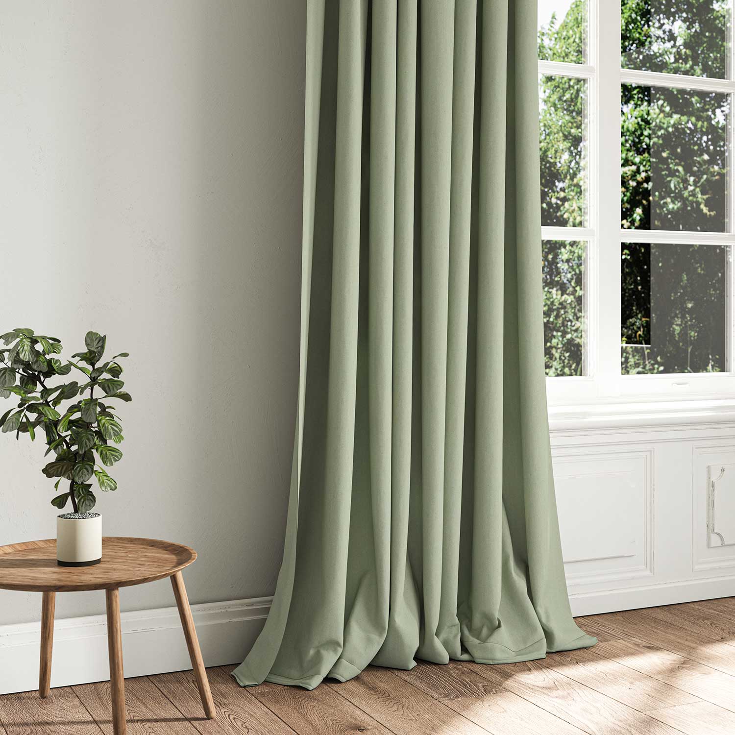 A green woven fabric shown as a curtain.