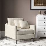 Chair covered in a boucle fabric in Almond