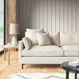 Sofa covered in a boucle fabric in Almond