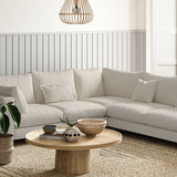 Sofa covered in a boucle fabric in Almond