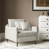 Chair covered in a boucle fabric in Linen