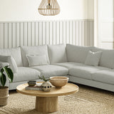 Sofa covered in a boucle fabric in Linen