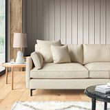 Sofa covered in a boucle fabric in Pumice