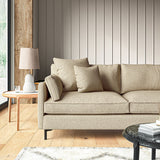 Sofa covered in a boucle fabric in Fawn