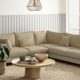 Sofa covered in a boucle fabric in Fudge