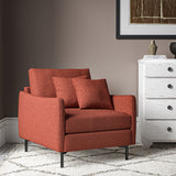 Chair covered in a boucle fabric in Carnelian