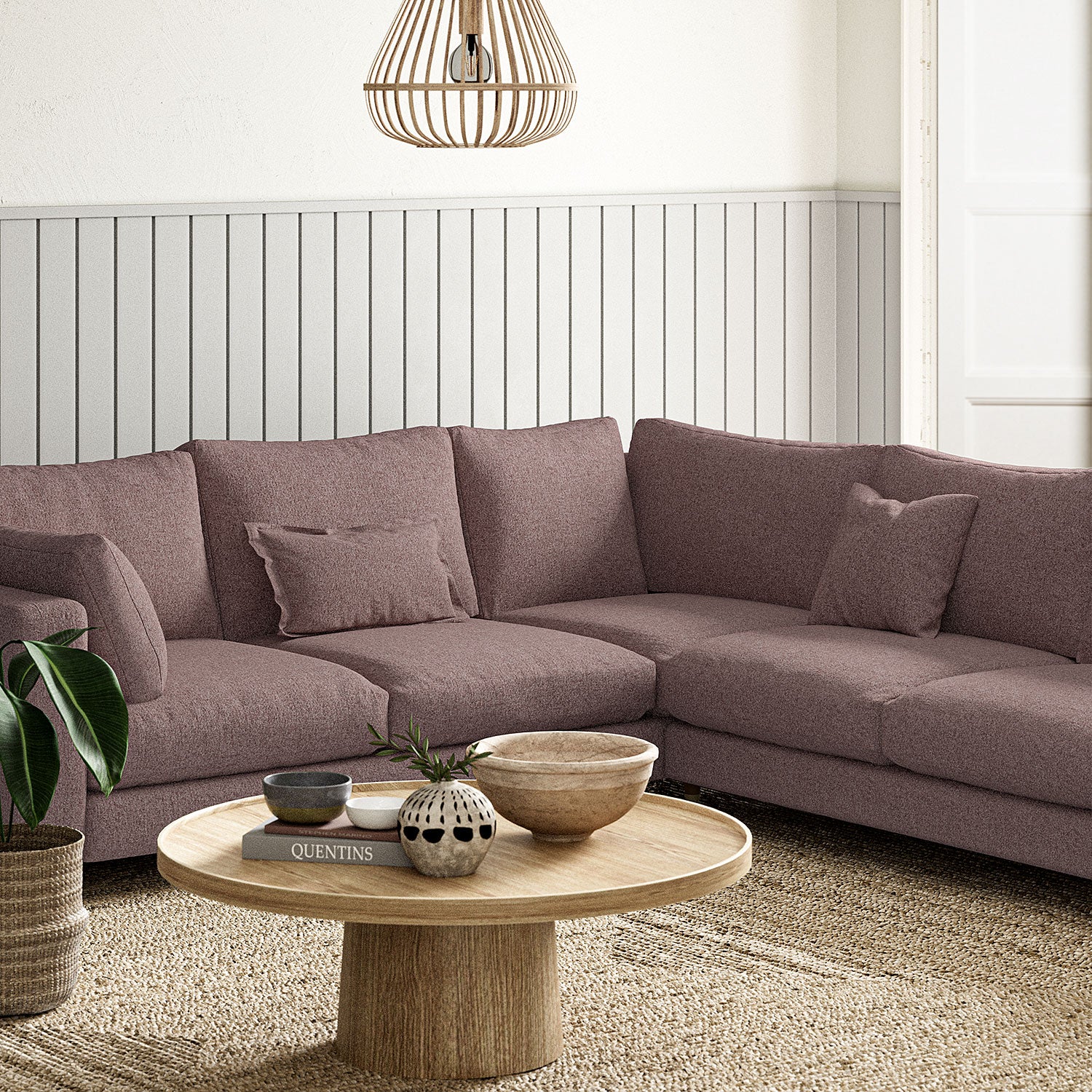 Sofa covered in a boucle fabric in Heather