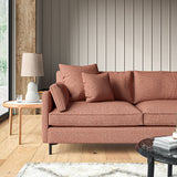 Sofa covered in a boucle fabric in Rose