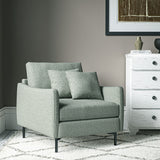 Chair covered in a boucle fabric in Mineral
