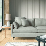 Sofa covered in a boucle fabric in Mineral