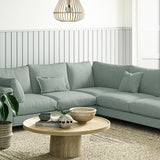Sofa covered in a boucle fabric in Mineral