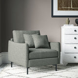 Chair covered in a boucle fabric in Fossil