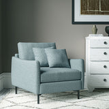 Chair covered in a boucle fabric in Cornflower