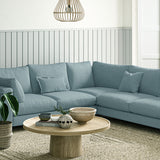 Sofa covered in a boucle fabric in Cornflower