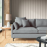 Sofa covered in a boucle fabric in Steel Blue