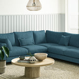 Sofa covered in a boucle fabric in Sapphire