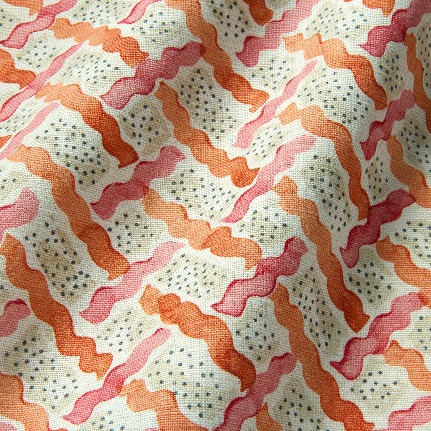Printed linen fabric - a contemporary lattice design in red, pink, cream and white