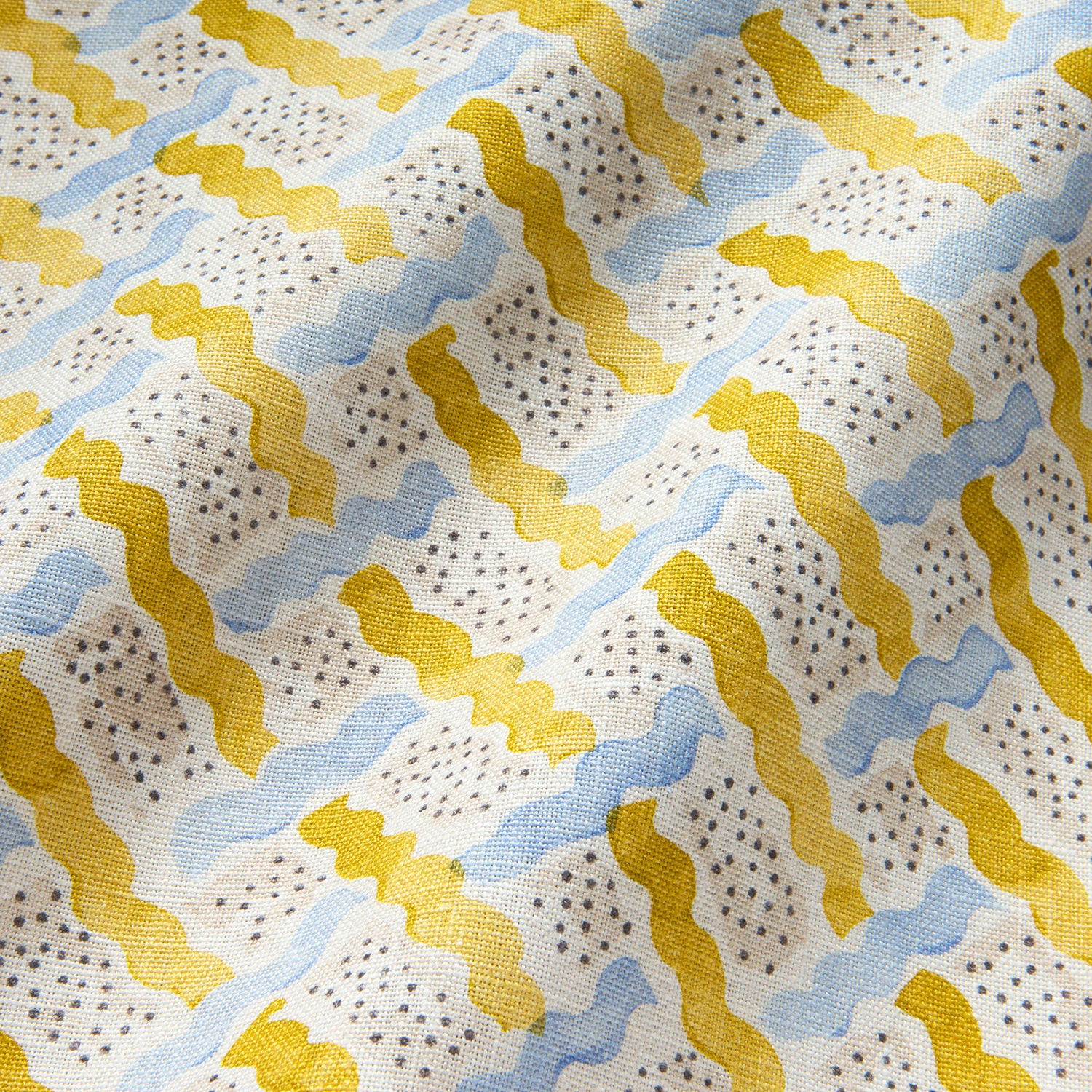 Printed linen fabric - a contemporary lattice design in yellow, blue, cream and white