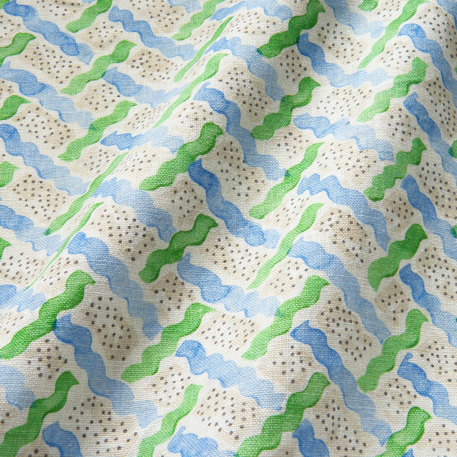 Printed linen fabric - a contemporary lattice design in green, blue, cream and white