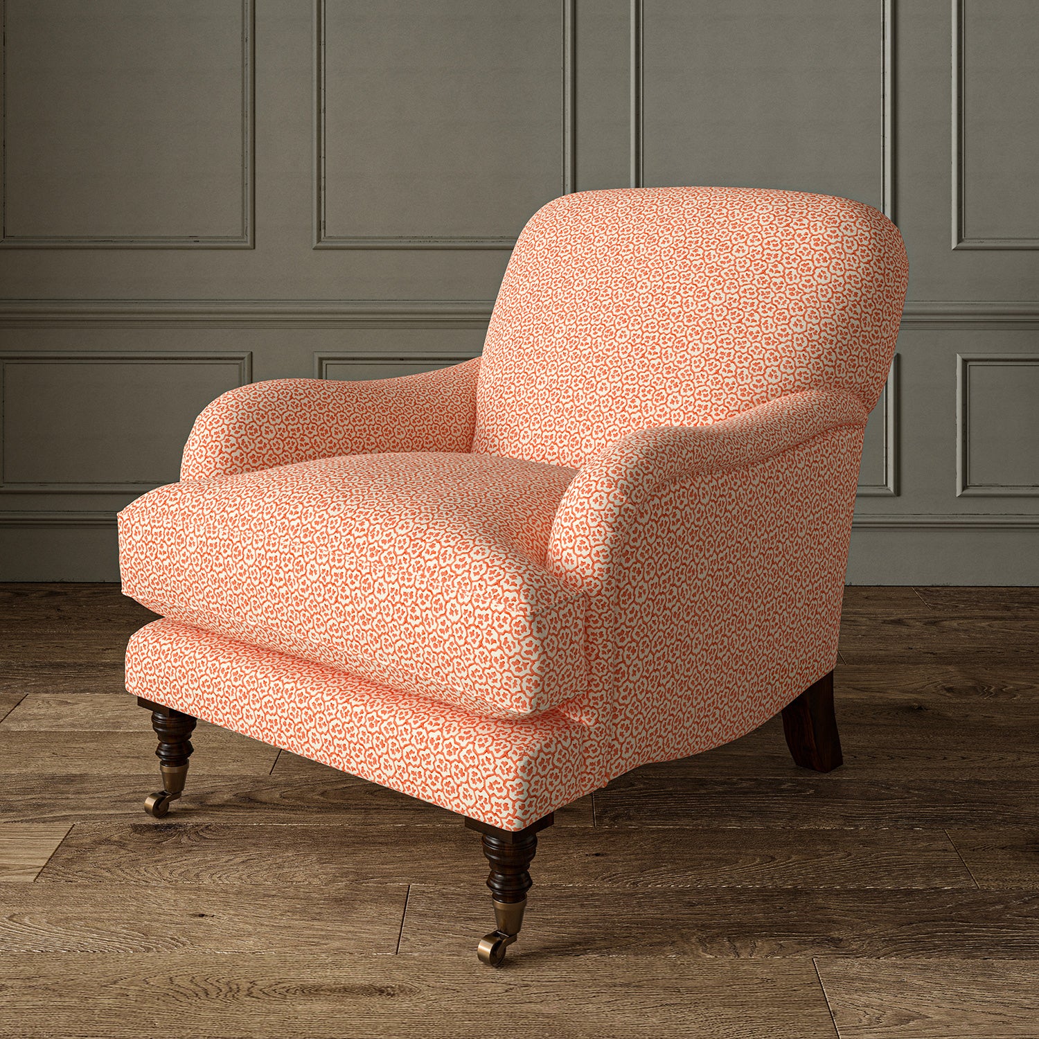 Printed linen fabric – a handy block print pattern in red and cream – on an armchair
