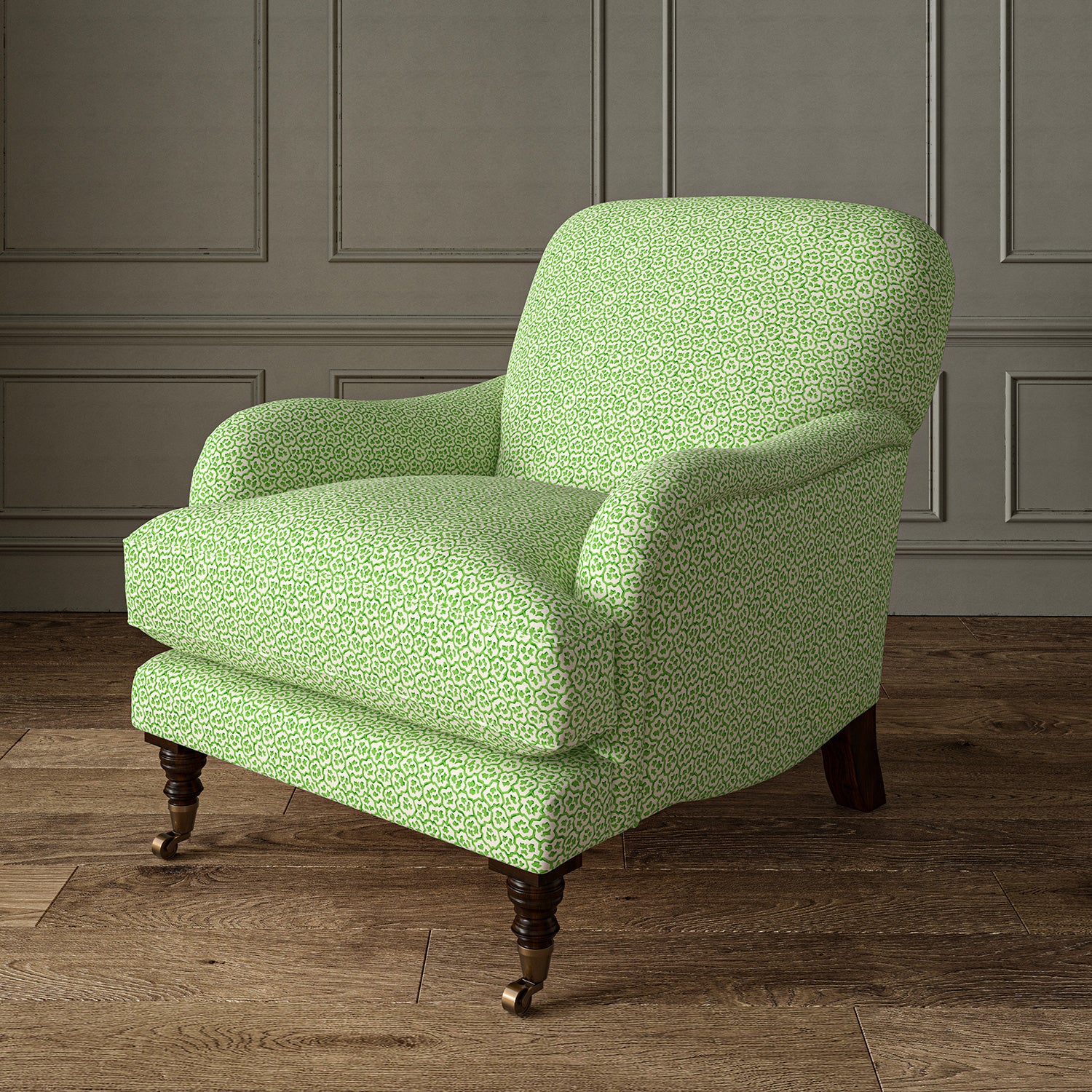 Printed linen fabric – a handy block print pattern in green and cream – on an armchair