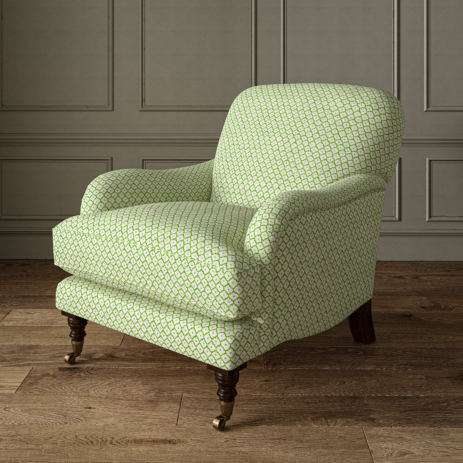 Printed linen fabric – a classic trellis design in blue, green, and cream – on an armchair