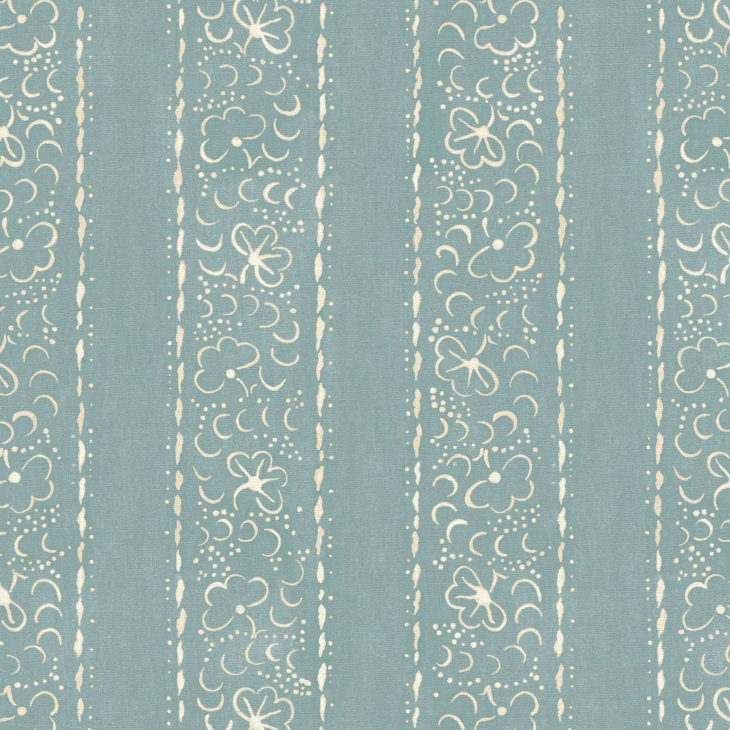 Printed linen fabric sample – a delicate pattern of moons and star-like dots in blue and cream