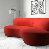 Sofa upholstered in a red velvet upholstery fabric