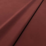 Fabric swatch of a red velvet upholstery fabric