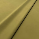 Fabric swatch of a green velvet upholstery fabric