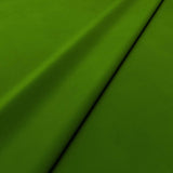 Fabric swatch of a green velvet upholstery fabric