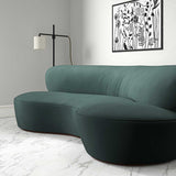 Sofa upholstered in a blue velvet upholstery fabric