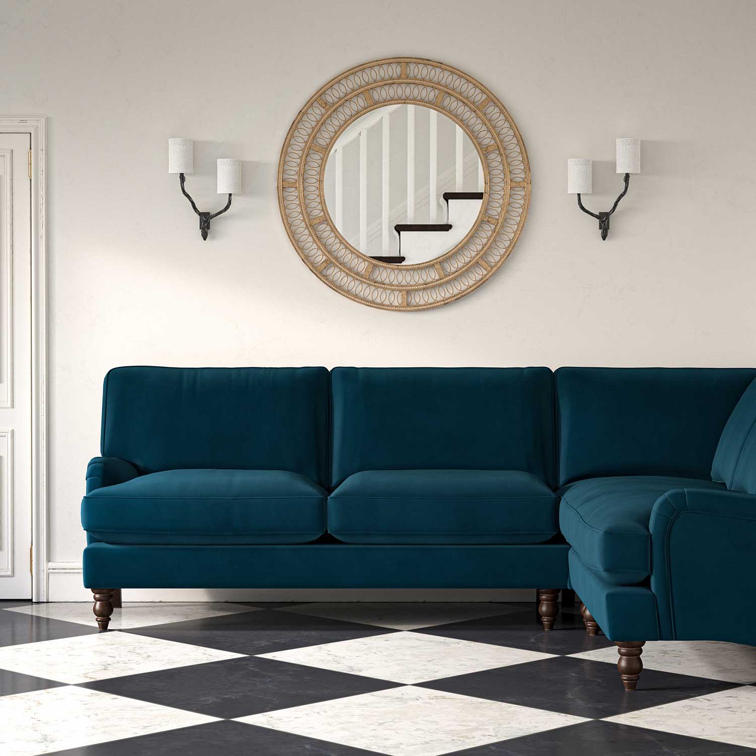 Sofa upholstered in a blue velvet upholstery fabric