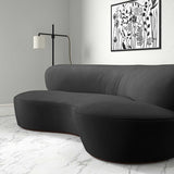 Sofa upholstered in a grey velvet upholstery fabric