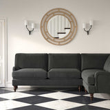 Sofa upholstered in a grey velvet upholstery fabric