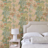 Bedroom featuring a tropical wallpaper with exotic, floral blossoms intertwined with bamboo.