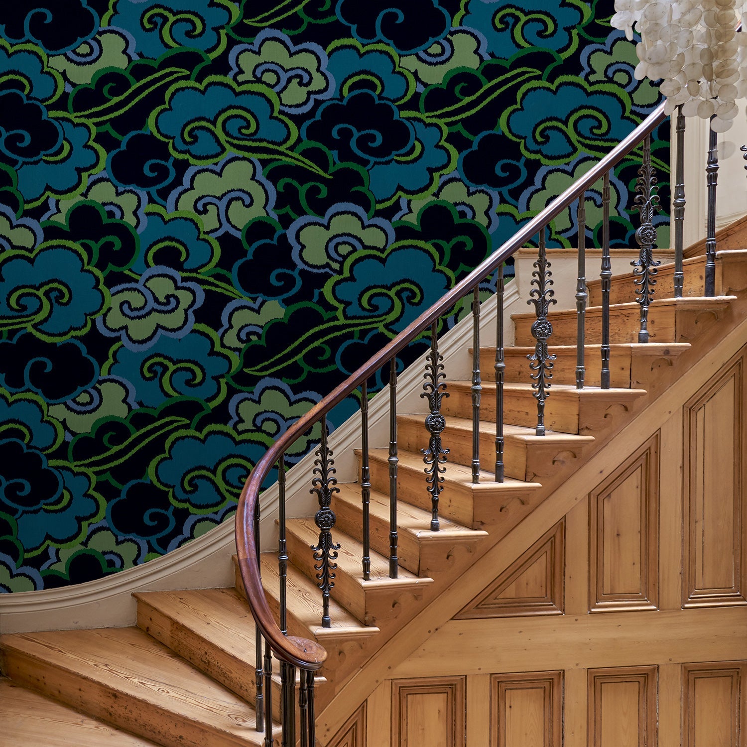 Inspired by a Japanese kimono, this designer wallpaper features an enchanting pattern of large abstract clouds.