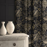 A printed velvet fabric showcasing an archival document, circa 1700s, this stylised floral is lavish, graceful, and timeless in blue, shown here as curtains